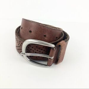 Brown
leather belt with punched leather design silver buckle
